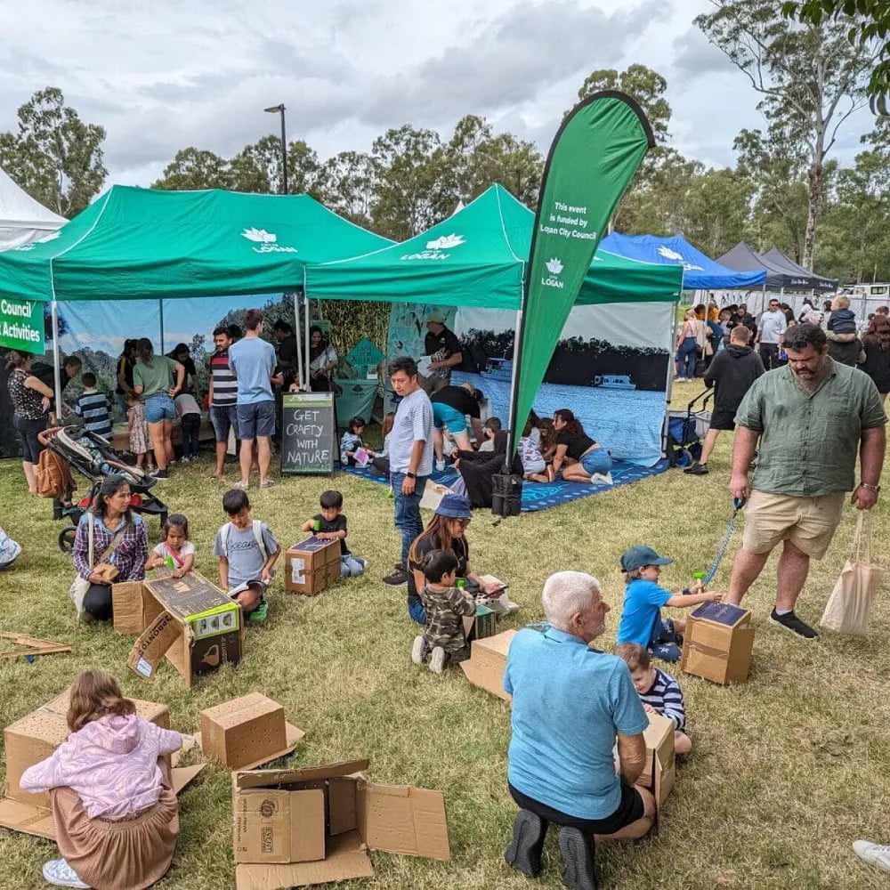 families engaging in a bush kindy pop-up event in logan