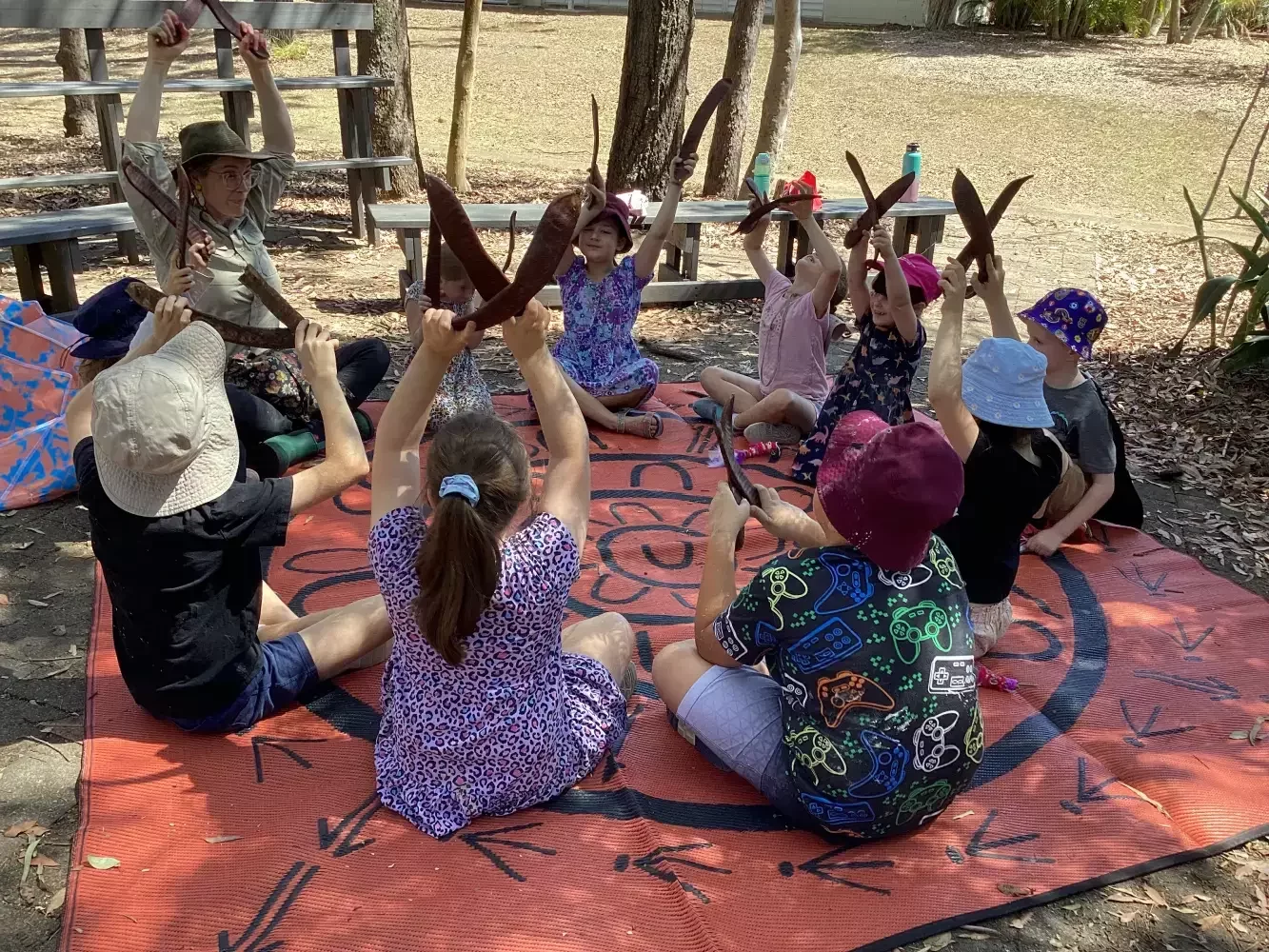 children enjoying song and play at a bush kindy session