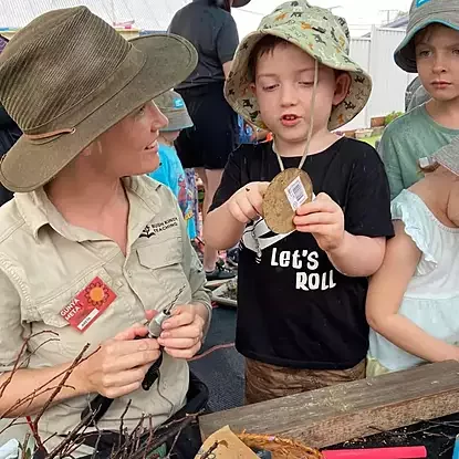 areta and child engaging in activity